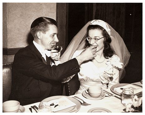 1948 - Bianca and Rob Wedding - goofy shared toast.jpg